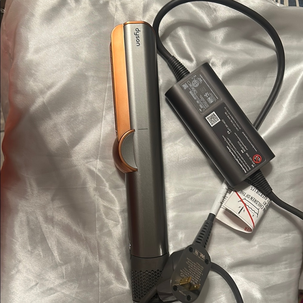 Dyson Silver and Orange Hair Tool